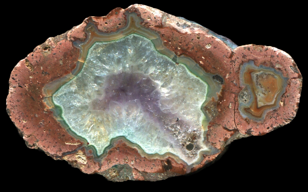 Tiny Felsenschlag Thunderegg with Amethyst
